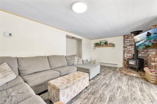 3530 Redecopp Road, Lake Country, BC - Indoor Photo Showing Living Room With Fireplace