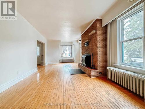 68 John St, Temiskaming Shores, ON - Indoor Photo Showing Other Room With Fireplace