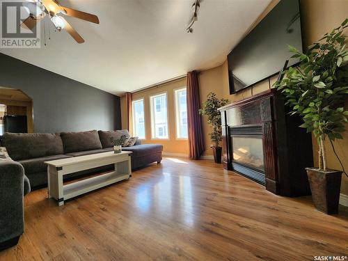 441 5Th Street, Weyburn, SK - Indoor Photo Showing Living Room With Fireplace