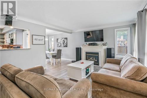 5019 Shirley Avenue, Niagara Falls, ON - Indoor Photo Showing Living Room With Fireplace