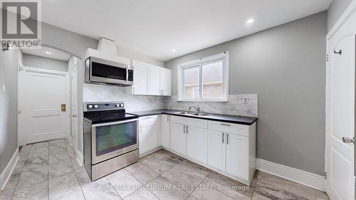 4 Athlone Place, St. Catharines, ON - Indoor Photo Showing Kitchen With Double Sink