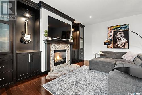 636 Beechdale Terrace, Saskatoon, SK - Indoor Photo Showing Living Room With Fireplace