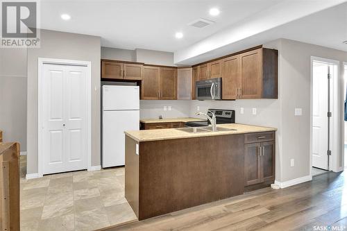 1123 Werschner Crescent, Saskatoon, SK - Indoor Photo Showing Kitchen With Double Sink