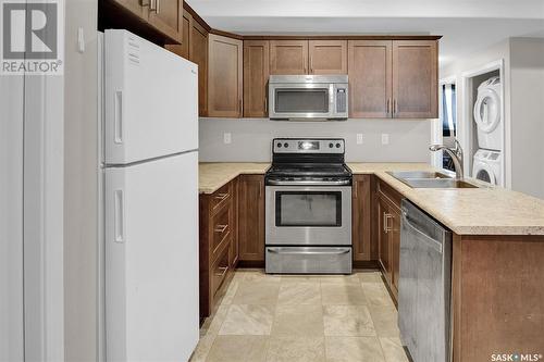 1123 Werschner Crescent, Saskatoon, SK - Indoor Photo Showing Kitchen With Stainless Steel Kitchen With Double Sink