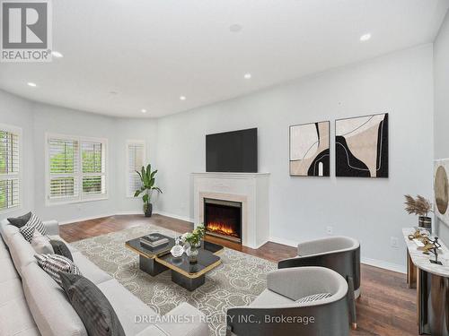 928 Golden Farmer Way, Mississauga (Meadowvale Village), ON - Indoor Photo Showing Living Room With Fireplace