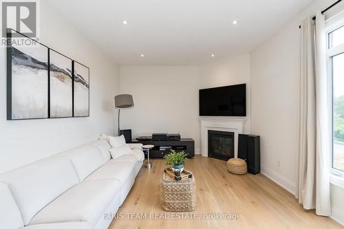 27 Muirfield Drive, Barrie (Ardagh), ON - Indoor Photo Showing Living Room With Fireplace