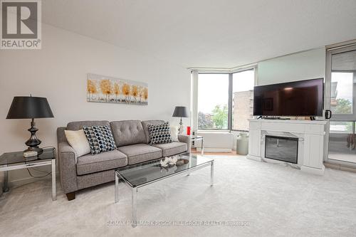 206 - 181 Collier Street, Barrie (North Shore), ON - Indoor Photo Showing Living Room