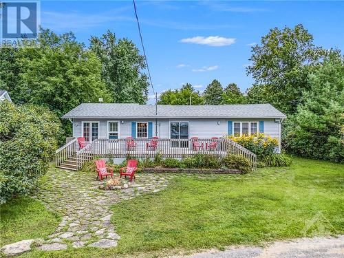 I’m looking at this sweet little bungalow from right across the street on the lake access lot. - 160 Birch Avenue, Carleton Place, ON - Outdoor With Deck Patio Veranda