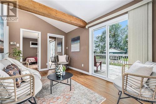 This is the front living room in the main house. Sitting on the couch you are looking past your deck to the water. - 160 Birch Avenue, Carleton Place, ON - Indoor Photo Showing Living Room