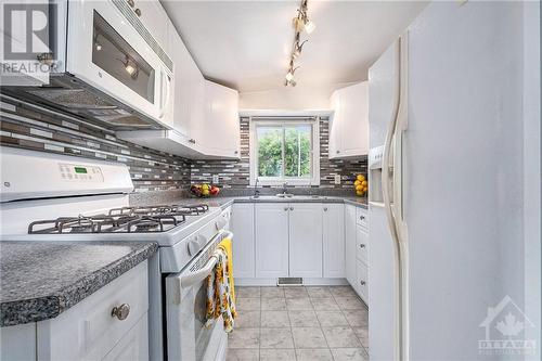 There’s lots of cupboards and counter space in this kitchen. Gas stove too, so even with power outages you can use the stove top. - 160 Birch Avenue, Carleton Place, ON - Indoor Photo Showing Kitchen