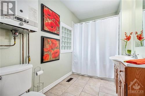 The main bathroom is a combo laundry room. - 160 Birch Avenue, Carleton Place, ON - Indoor Photo Showing Bathroom