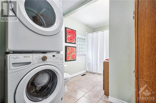 Main bathroom laundry combo on a bit better angle. - 160 Birch Avenue, Carleton Place, ON - Indoor Photo Showing Laundry Room