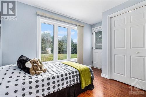 This is the homes 3rd bedroom in the guest room side it has direct access to the back yard and the front deck. - 160 Birch Avenue, Carleton Place, ON - Indoor Photo Showing Bedroom