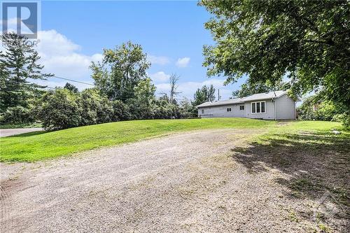 There sure looks like a lot of room if you wanted to add a garage or big storage shed and still park several cars, there’s already a hydro hook up. - 160 Birch Avenue, Carleton Place, ON - Outdoor