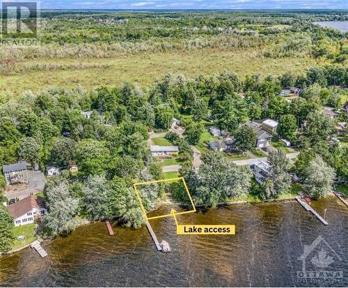 This a rough outline of where the waterfront lot across the road covers. It’s just over 100 feet wide with a sandy bottom at the shore. - 160 Birch Avenue, Carleton Place, ON - Outdoor With Body Of Water With View