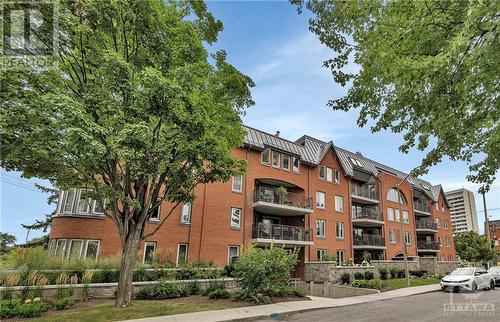 130 Queen Elizabeth Drive Unit#301, Ottawa, ON - Outdoor With Balcony With Facade