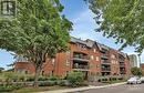 130 Queen Elizabeth Drive Unit#301, Ottawa, ON  - Outdoor With Balcony With Facade 