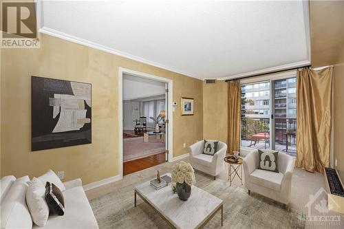 Virtually staged - 130 Queen Elizabeth Drive Unit#301, Ottawa, ON - Indoor Photo Showing Living Room