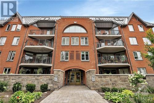 130 Queen Elizabeth Drive Unit#301, Ottawa, ON - Outdoor With Balcony With Facade