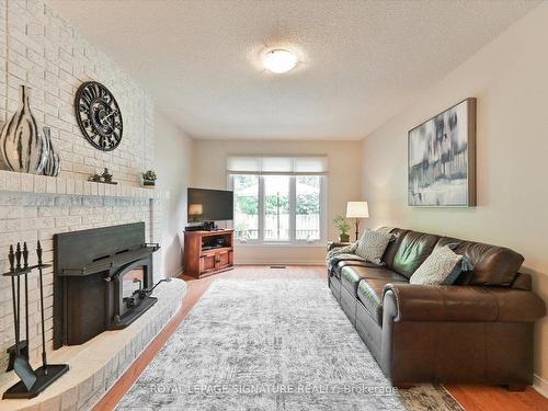 4128 Powderhorn Cres, Mississauga, ON - Indoor Photo Showing Living Room With Fireplace