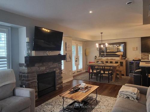 2 Carnoustie Lane, Georgian Bay, ON - Indoor Photo Showing Living Room With Fireplace