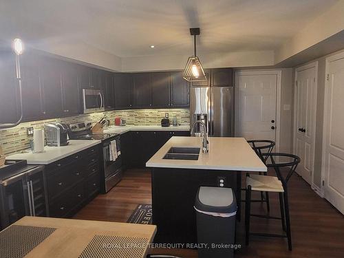 2 Carnoustie Lane, Georgian Bay, ON - Indoor Photo Showing Kitchen With Stainless Steel Kitchen With Double Sink With Upgraded Kitchen