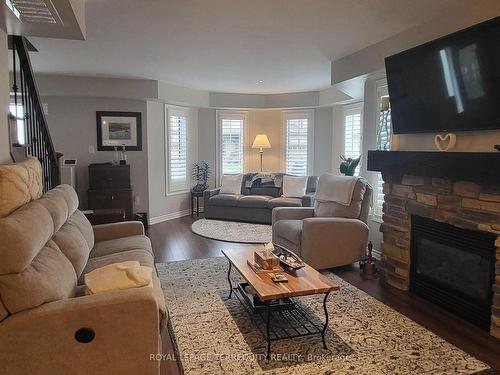 2 Carnoustie Lane, Georgian Bay, ON - Indoor Photo Showing Living Room With Fireplace