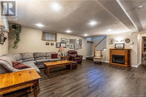 16 Hillary Crescent, Moncton, NB - Indoor Photo Showing Living Room With Fireplace