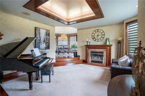 7775 St. Augustine Crescent, Niagara Falls, ON - Indoor Photo Showing Living Room With Fireplace