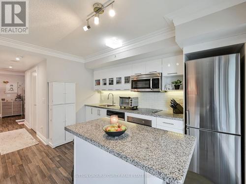 W306 - 565 Wilson Avenue, Toronto (Clanton Park), ON - Indoor Photo Showing Kitchen With Upgraded Kitchen