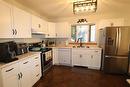 228 Head Avenue, The Pas, MB  - Indoor Photo Showing Kitchen With Double Sink 