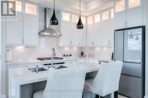 #706 - 11782 Ninth Line, Whitchurch-Stouffville (Stouffville), ON - Indoor Photo Showing Kitchen With Upgraded Kitchen