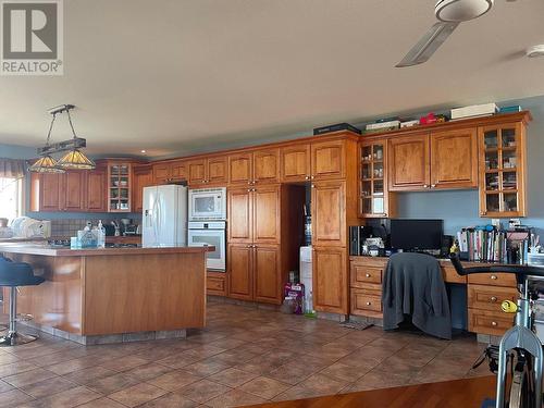 4601 Barber Court, Fort Nelson, BC - Indoor Photo Showing Kitchen