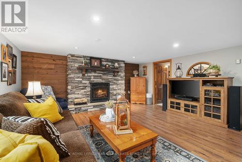 30 Grant Drive, Kawartha Lakes (Oakwood), ON - Indoor Photo Showing Living Room With Fireplace