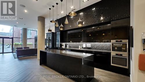 303 - 90 Broadview Avenue E, Toronto (South Riverdale), ON - Indoor Photo Showing Kitchen With Upgraded Kitchen