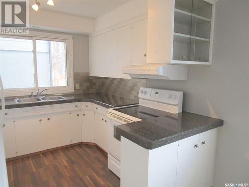 504 4Th Avenue E, Assiniboia, SK - Indoor Photo Showing Kitchen With Double Sink