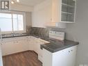 504 4Th Avenue E, Assiniboia, SK  - Indoor Photo Showing Kitchen With Double Sink 