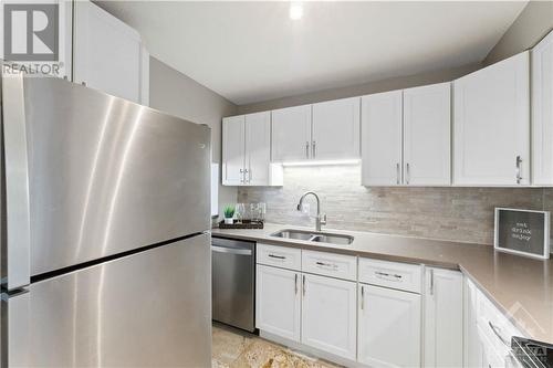 Kitchen w SS appliances - 222 Guigues Avenue Unit#401, Ottawa, ON - Indoor Photo Showing Kitchen With Double Sink