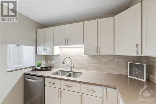 Kitchen w SS appliances - 222 Guigues Avenue Unit#401, Ottawa, ON - Indoor Photo Showing Kitchen With Double Sink