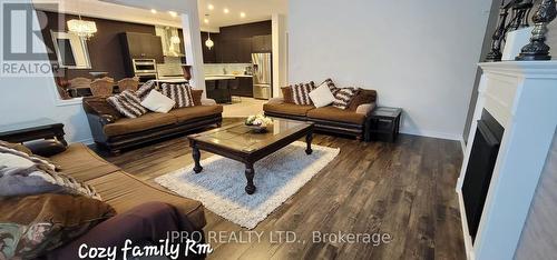 181 Trail Boulevard, Springwater (Centre Vespra), ON - Indoor Photo Showing Living Room With Fireplace