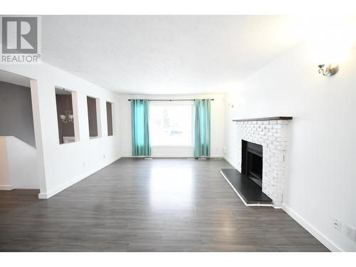 9303 111 Avenue, Fort St. John, BC - Indoor Photo Showing Other Room With Fireplace