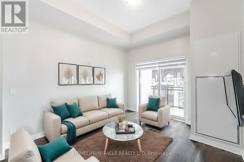 625 - 128 Grovewood Common, Oakville, ON - Indoor Photo Showing Living Room