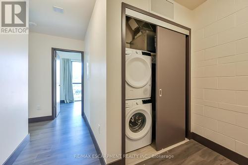 601 - 121 King Street E, Hamilton (Beasley), ON - Indoor Photo Showing Laundry Room