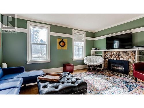 4008 Pleasant Valley Road, Vernon, BC - Indoor Photo Showing Living Room With Fireplace