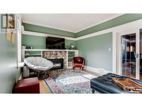 4008 Pleasant Valley Road, Vernon, BC - Indoor Photo Showing Living Room With Fireplace