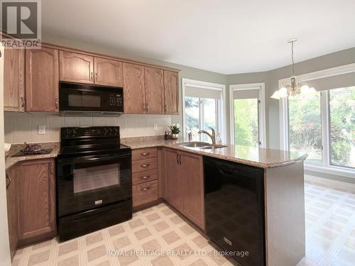 12 Ports Drive, Kawartha Lakes (Bobcaygeon), ON - Indoor Photo Showing Kitchen With Double Sink