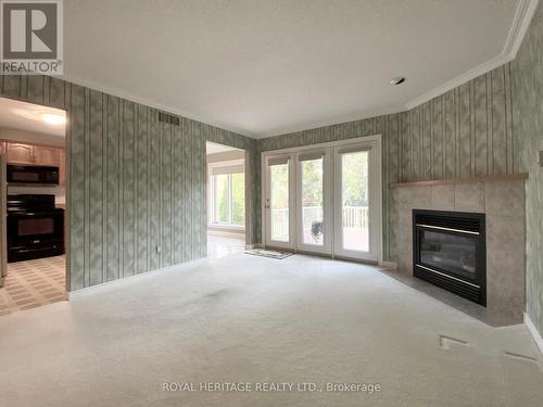 12 Ports Drive, Kawartha Lakes (Bobcaygeon), ON - Indoor Photo Showing Living Room With Fireplace