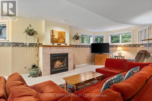 12 Ports Drive, Kawartha Lakes (Bobcaygeon), ON - Indoor Photo Showing Living Room With Fireplace