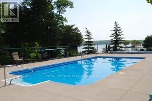 12 Ports Drive, Kawartha Lakes (Bobcaygeon), ON - Outdoor With In Ground Pool With Backyard