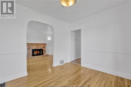 2397 Chandler, Windsor, ON - Indoor Photo Showing Other Room With Fireplace